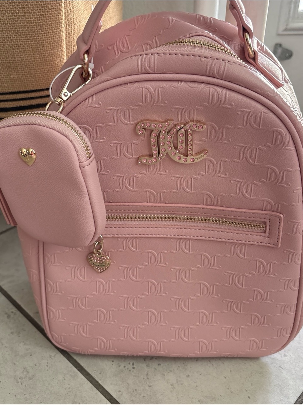 Juicy Couture Blush Pink Embossed Logo Mini Backpack with Gold Accents